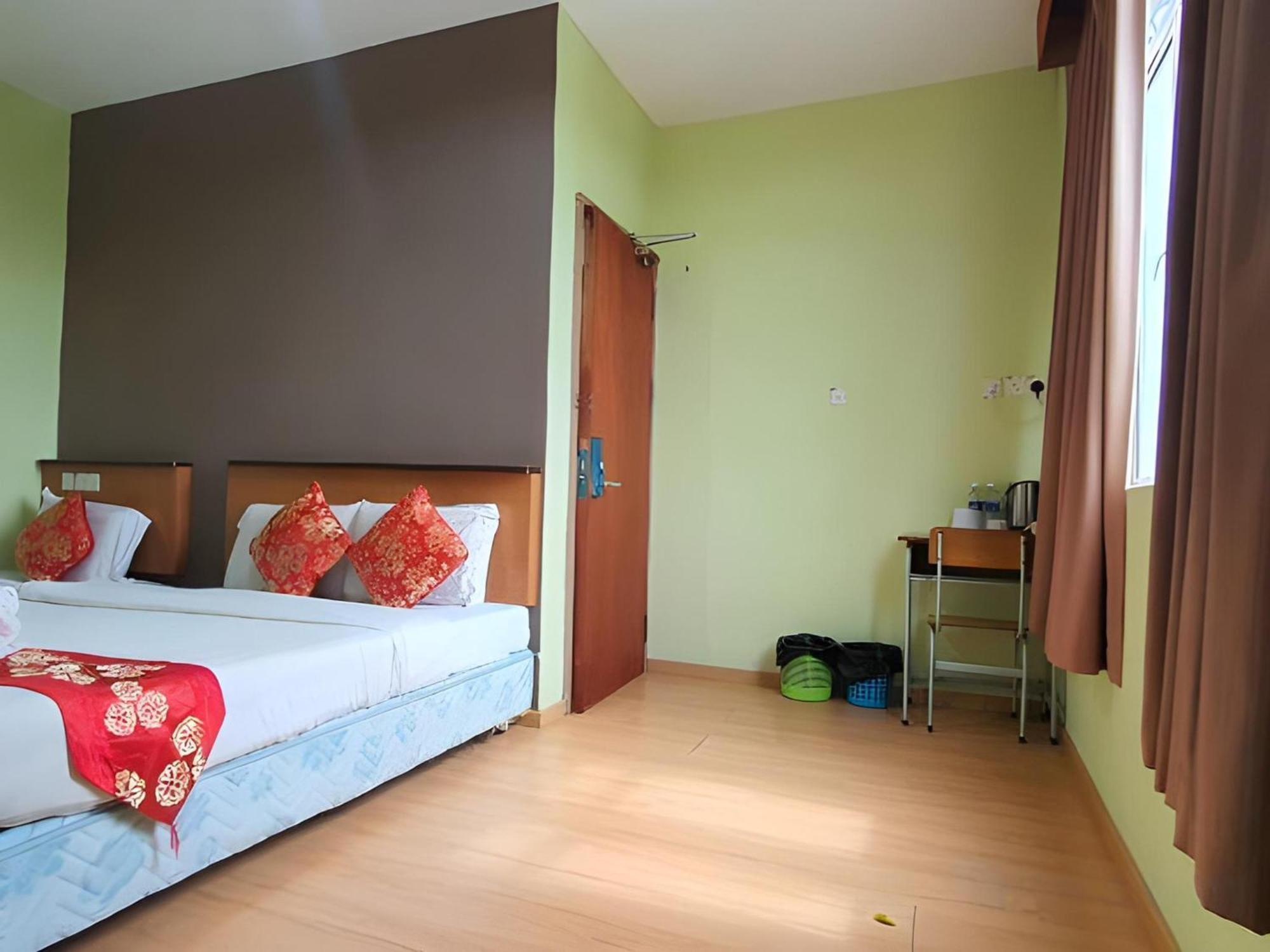 Oyo 90964 Melody 88 Inn Мірі Екстер'єр фото